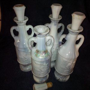 4 Vintage Slag Glass Whiskey Bottles